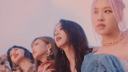 A picture of the four members of BLACKPINK (left to right: Lisa, Jennie, Jisoo, Rosé) in the MV for their single Lovesick Girls
