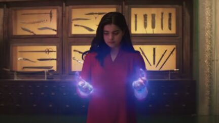 Kamala Khan looks over her glowing hands in Ms. Marvel.