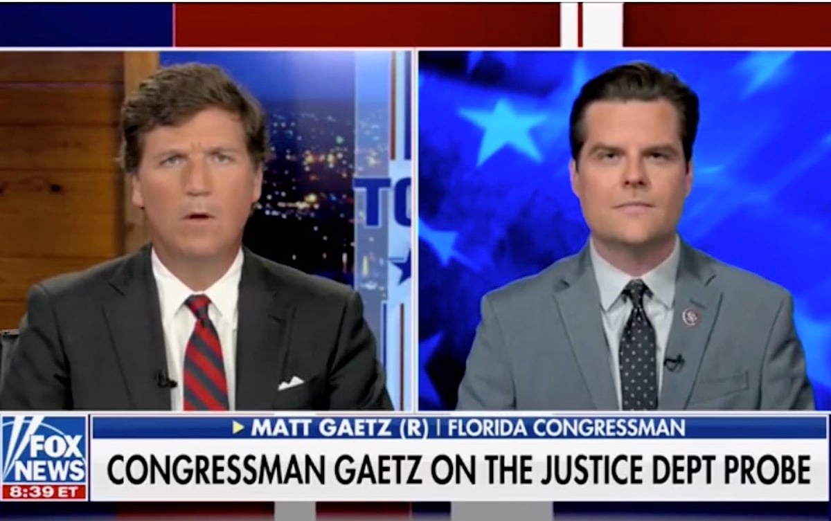 Tucker Carlson makes his confused face while interviewing Matt Gaetz in split screen on Fox News.