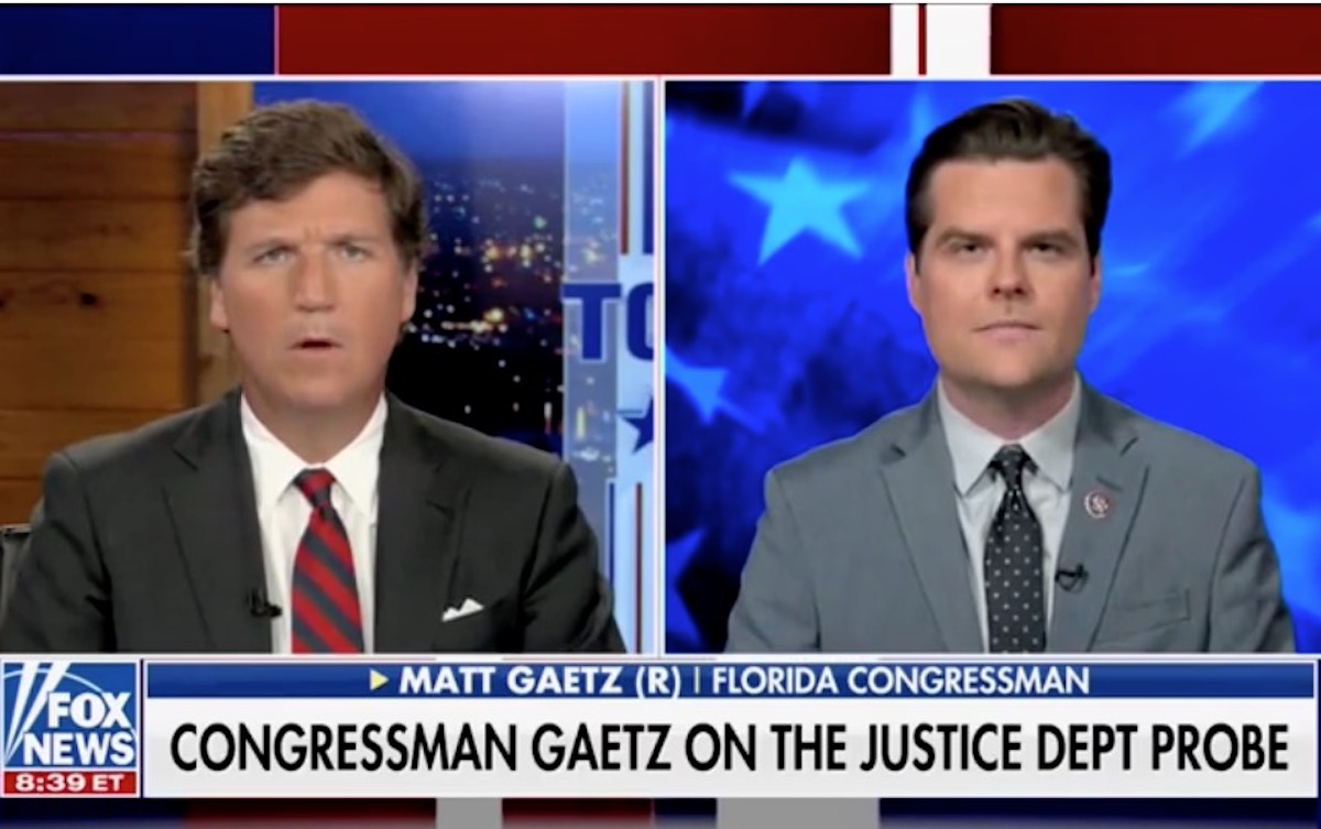 Tucker Carlson makes his confused face while interviewing Matt Gaetz in split screen on Fox News.