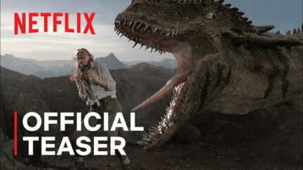 Karen Gillan yelling as a dino tries to eat her