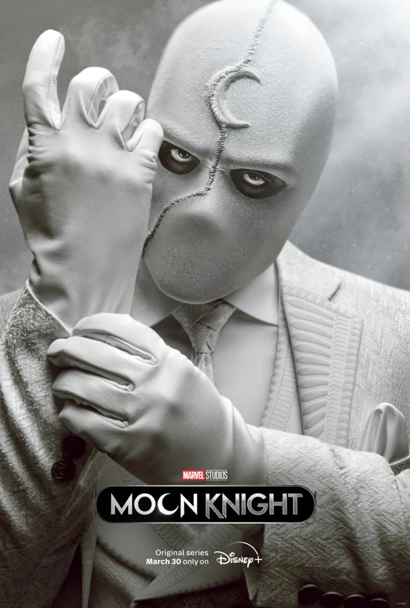 Mr Knight adjusting his gloves and his all white suit in a new poster for Marvel's Moon Knight on Disney+