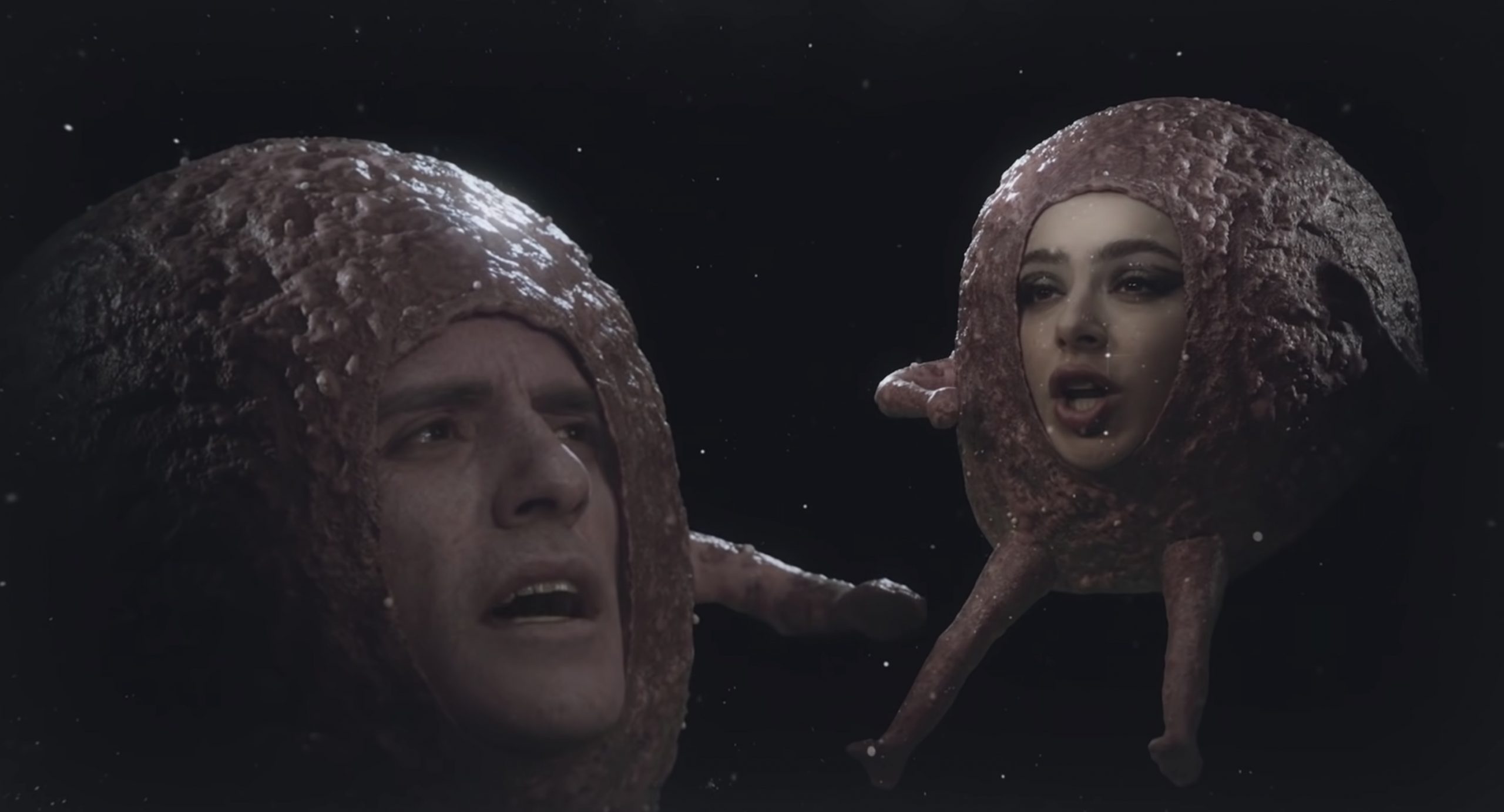 Oscar Isaac and Charli XCX dressed as meatballs.
