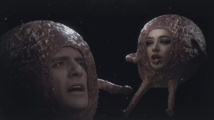 Oscar Isaac and Charli XCX dressed as meatballs.