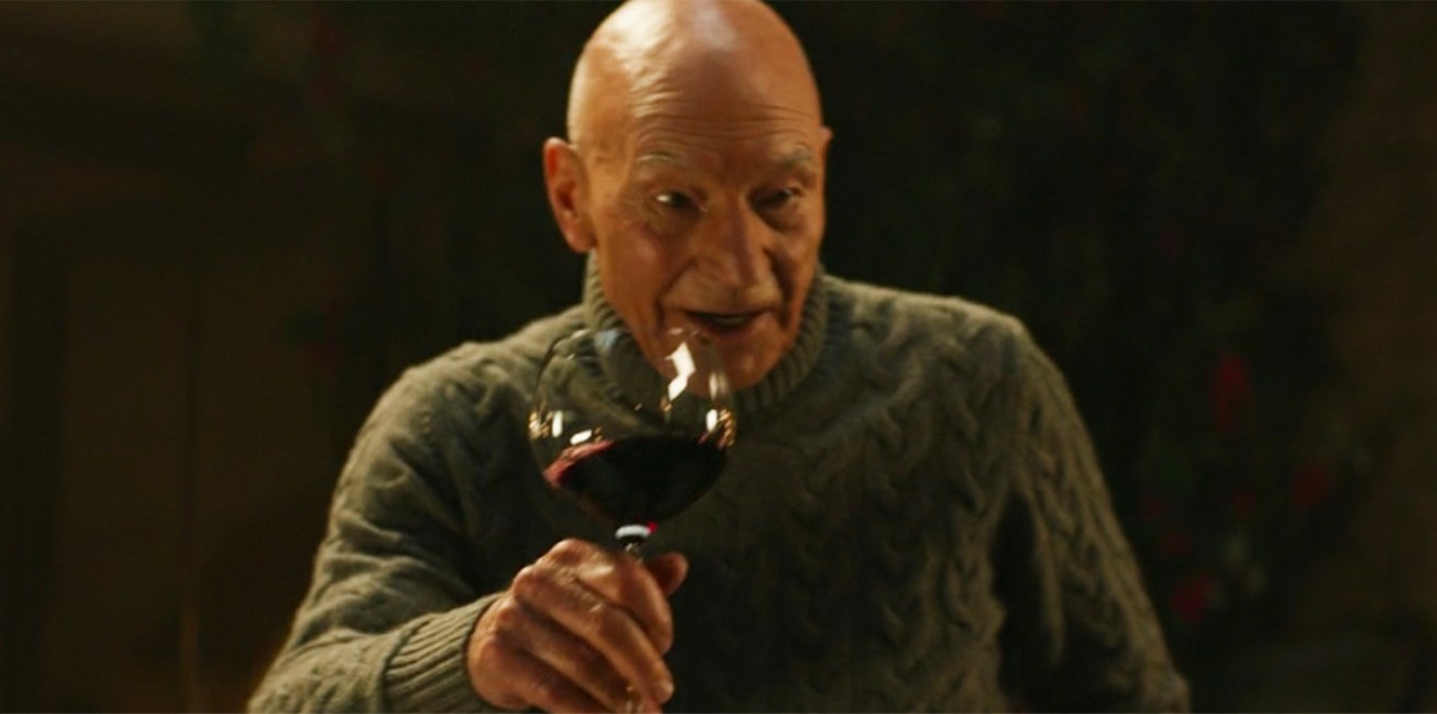 Jean Luc Picard holding a wine glass