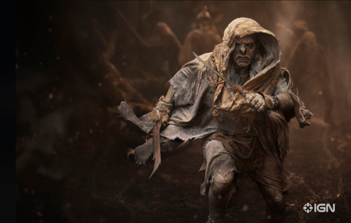 A hooded orc running with a large blade