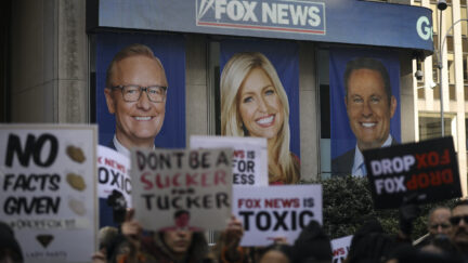 Protesters rally against Fox News outside the Fox News headquarters