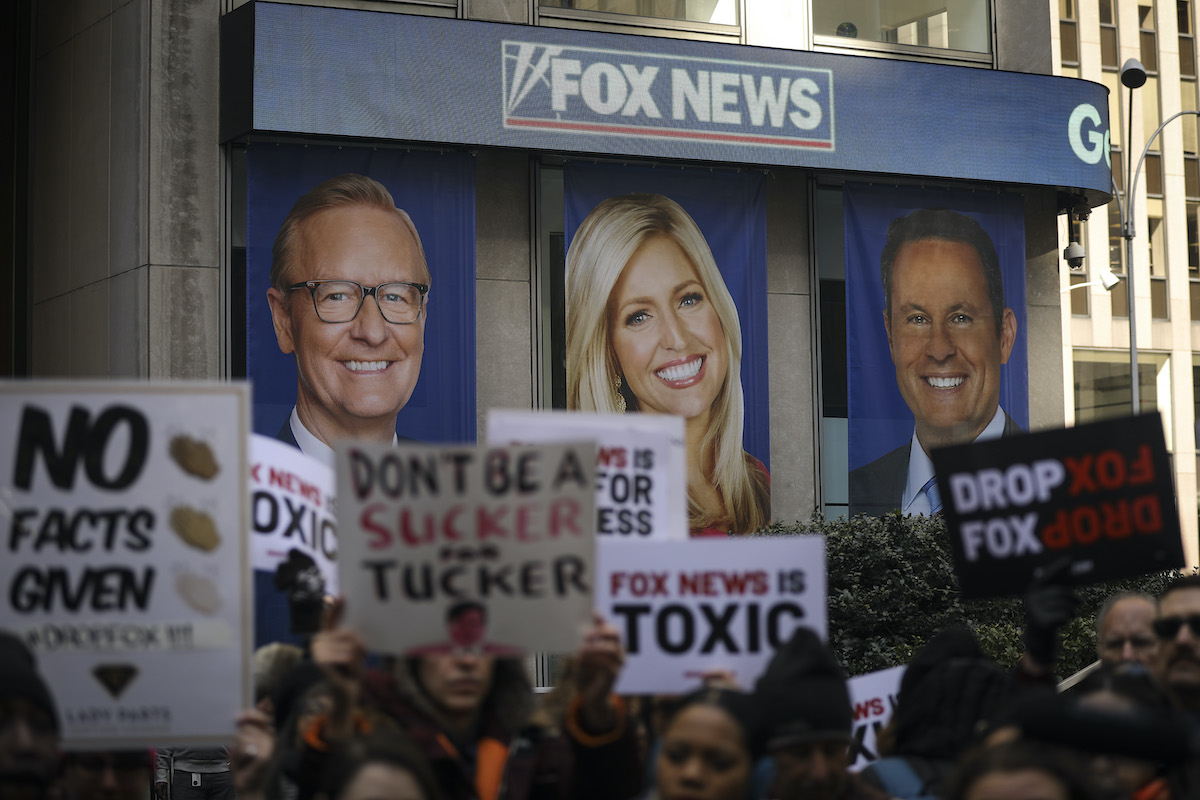 Protesters rally against Fox News outside the Fox News headquarters