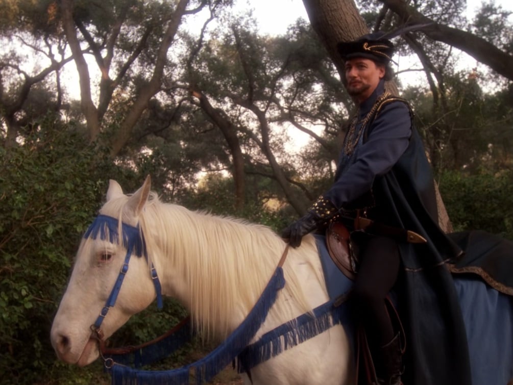 Q as the Sheriff of Nottingham atop his horse