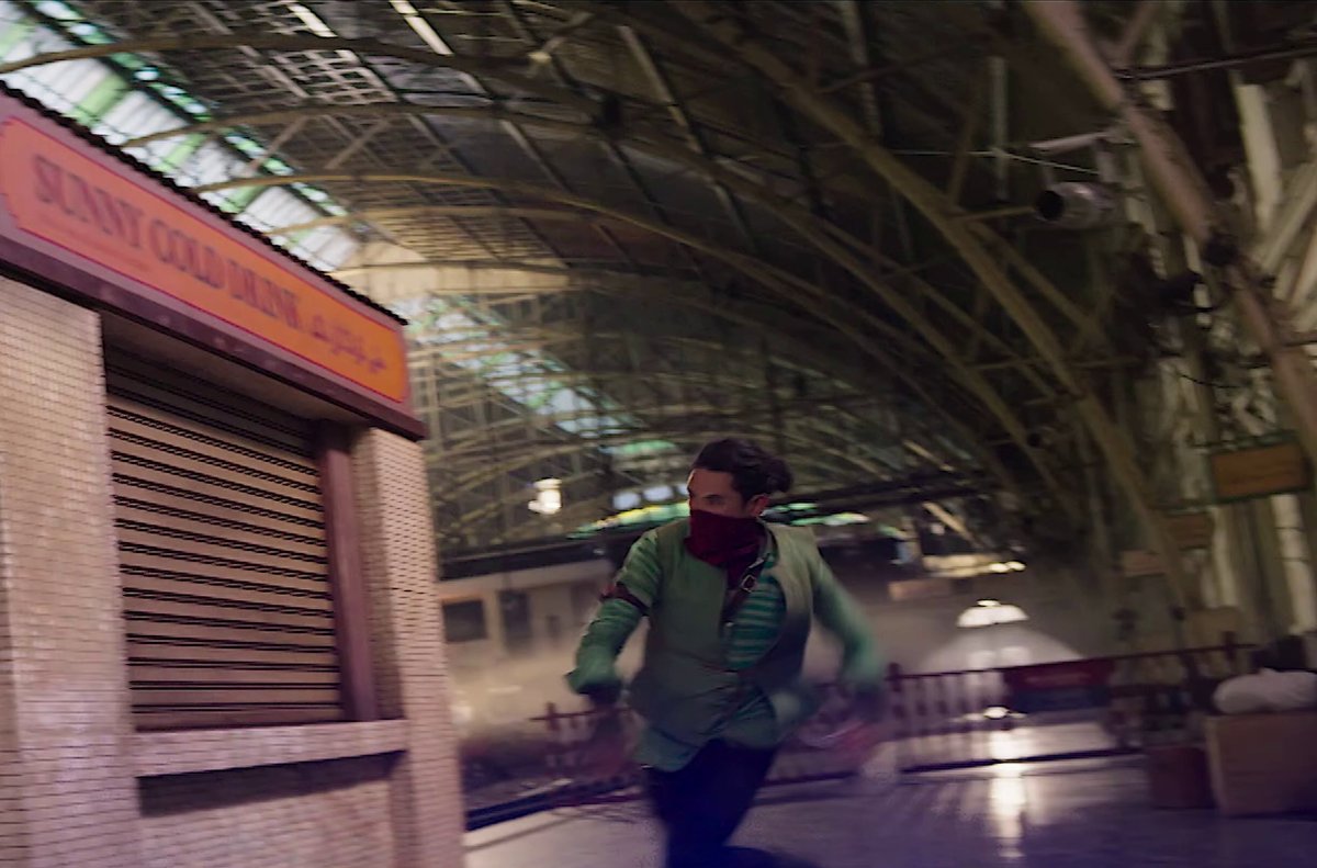 Red Dagger running up the side of a subway kiosk