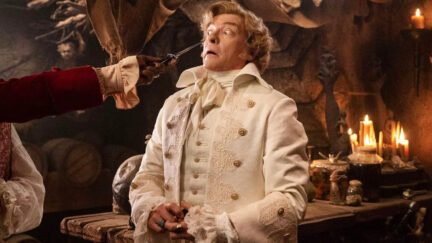 Rhys Darby at knifepoint as Stede Bonnet in 'Our Flag Means Death'