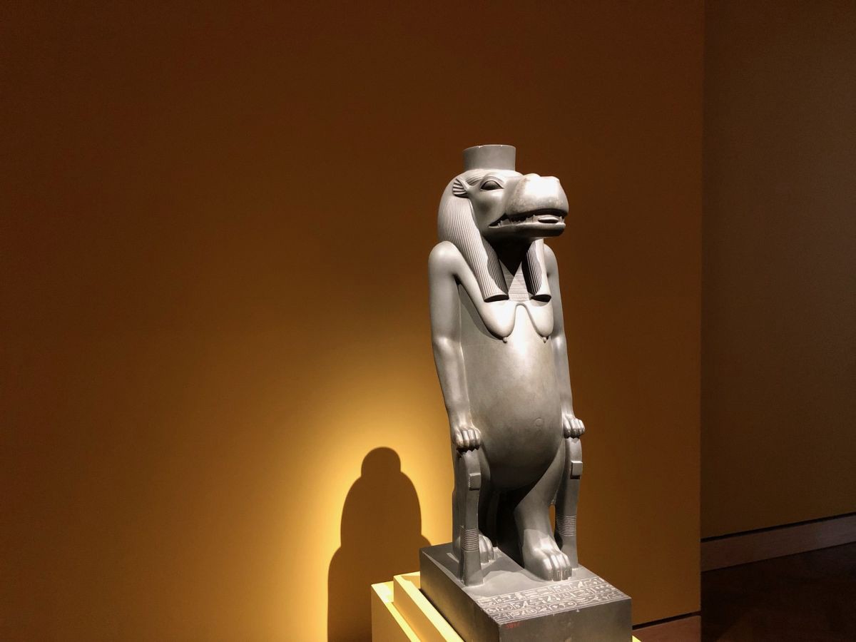 A statue of Taweret, an Egyptian goddess with a hippo's head.