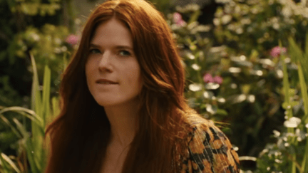 Rose Leslie bites her lip and looks askance in the trailer for TIme Traveler's Wife