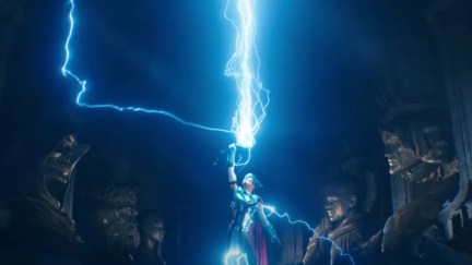 Jane, as the Mighty Thor, summons lightning with Mjolnir.