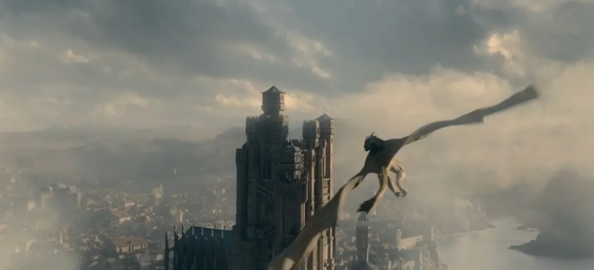 A Targaryen dragonknight on top of a dragon flying over King's Landing in 'House of the Dragon'