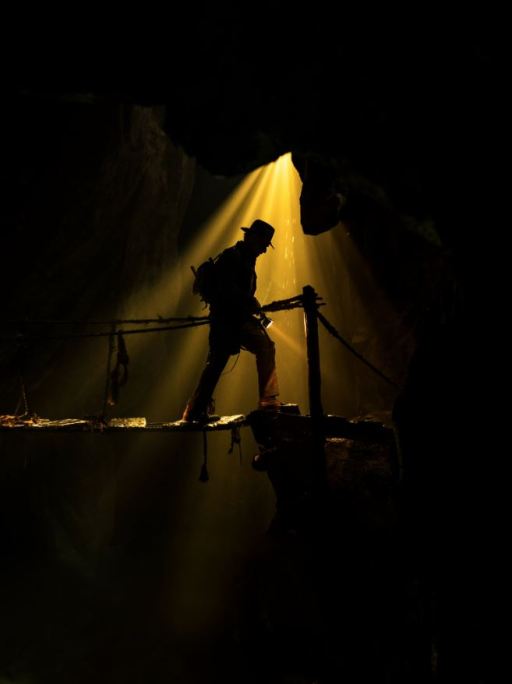 Poster for Indiana Jones 5. Harrison Ford dimly lit in a cave? Image: Disney, Lucas Films