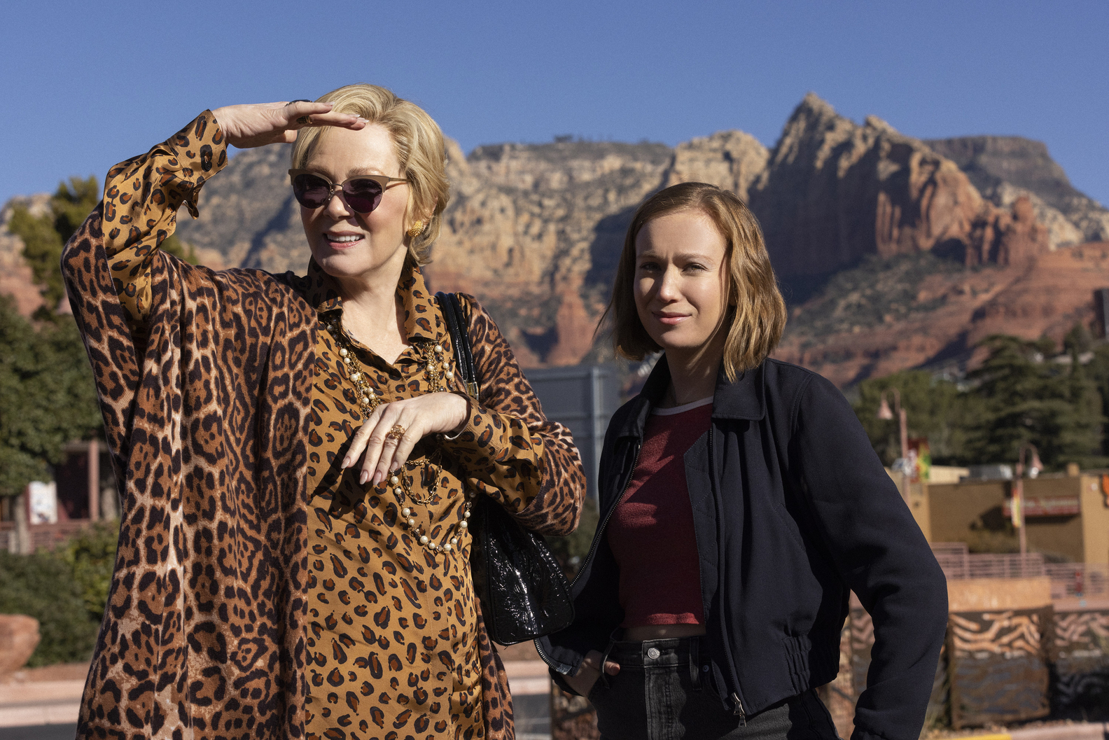 Jean Smart as Deborah Vance and Hannah Einbinder as Ava in Hacks, standing in the desert.