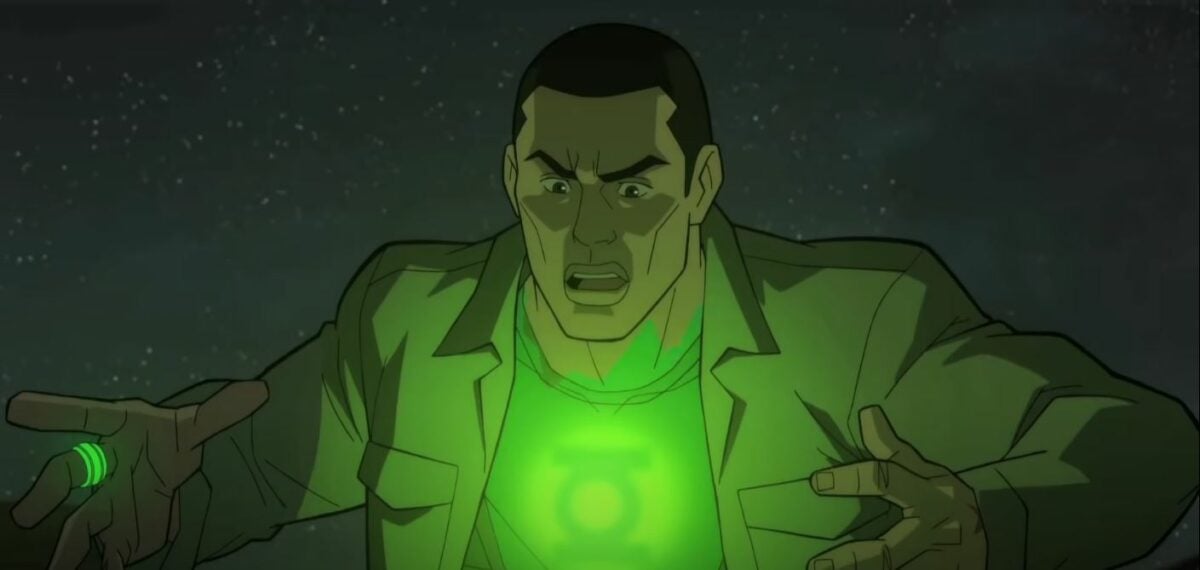 John Stewart Green Lantern with symbol and glowing green ring.  Image: screenshot from trailer https://www.youtube.com/watch?v=LW3AlcgUENE