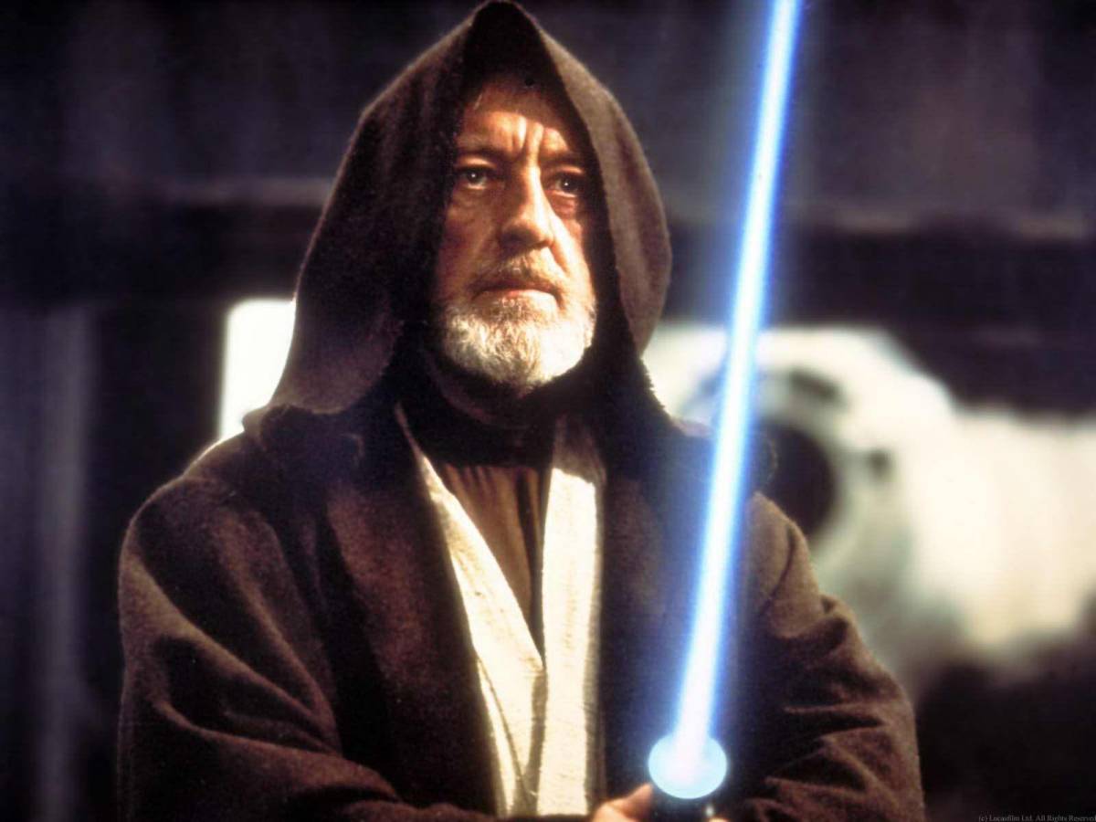 Old Obi-Wan Kenobi wielding a lightsaber