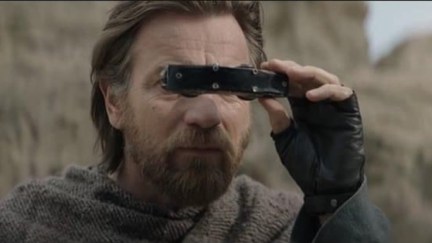 Obi-Wan Kenobi looking through space binoculars in the Obi-Wan Kenobi Disney+ series.