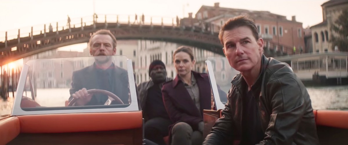 Tom Cruise, Simon Pegg, Rebecca Ferguson, and Ving Rhames speed through Venice on a boat