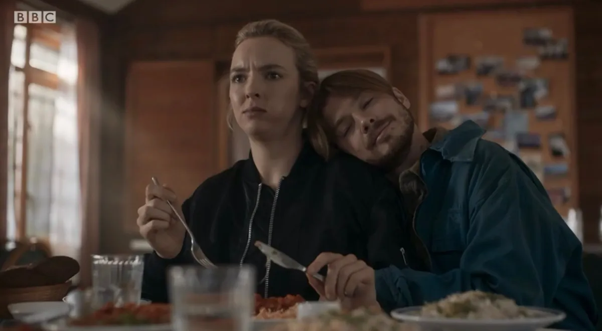 Villanelle and her brother at a restaurant in season 3