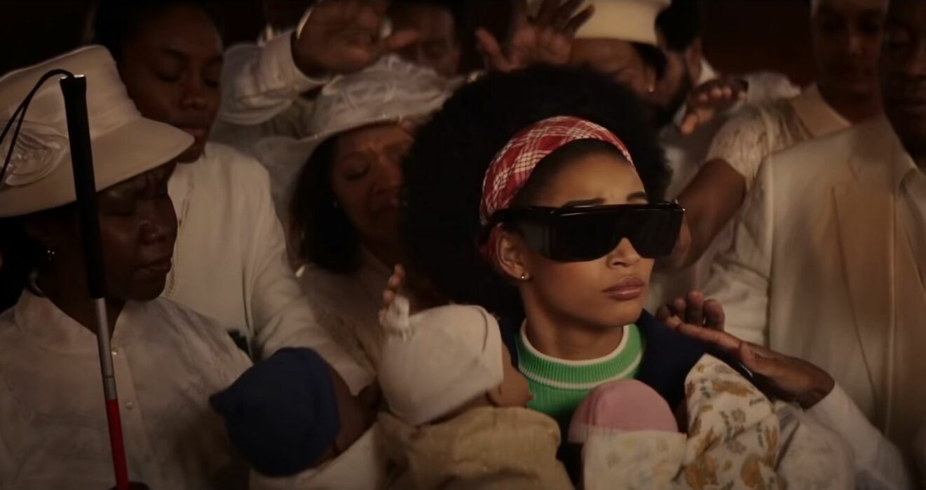 Amandla Stenberg blind and holding serval babies in the fictional movie "Black Pain." Image: Showtime.