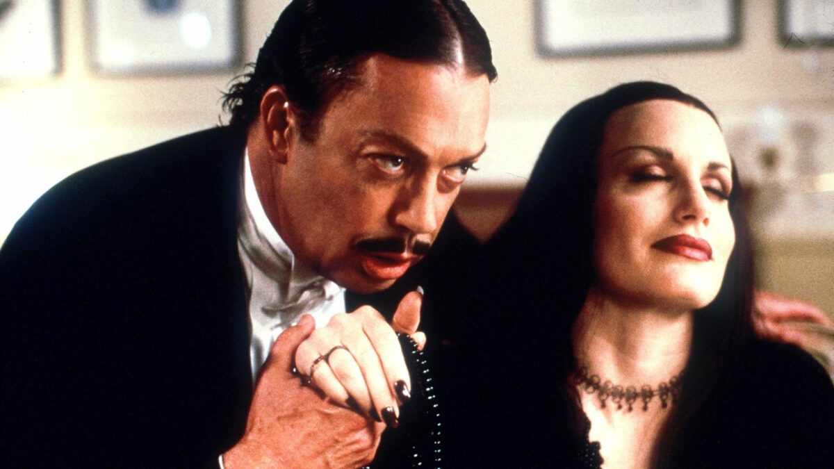 Daryl Hannah as Morticia and Tim Curry as Gomez in Addams Family Reunion