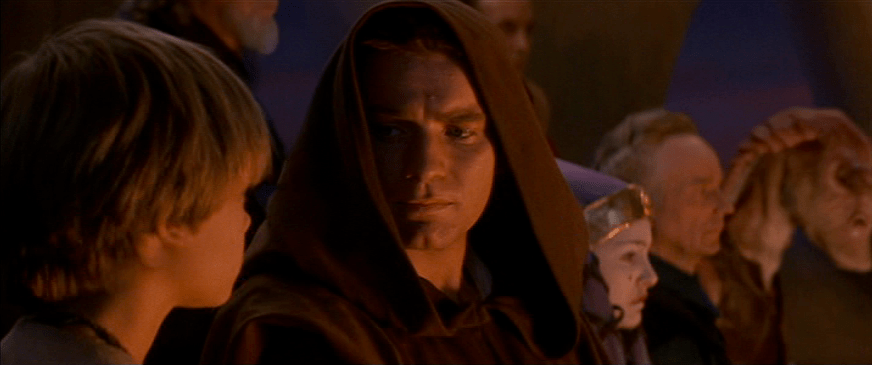 Obi-Wan stares at his new padawan and future killer, 9 year old Anakin Skywalker