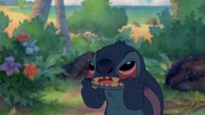 Stitch from Lilo & Stitch dragging the skin from the bottom of his eyes out of frustration. Image: Disney.
