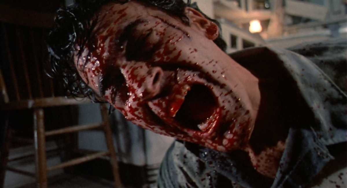 Ash screaming in pain in Evil Dead II