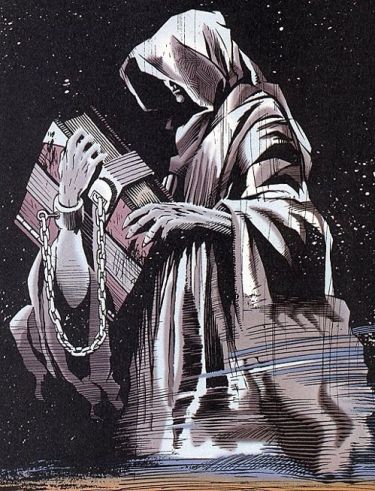 A man in a hooded robe hold a huge book in his hands.