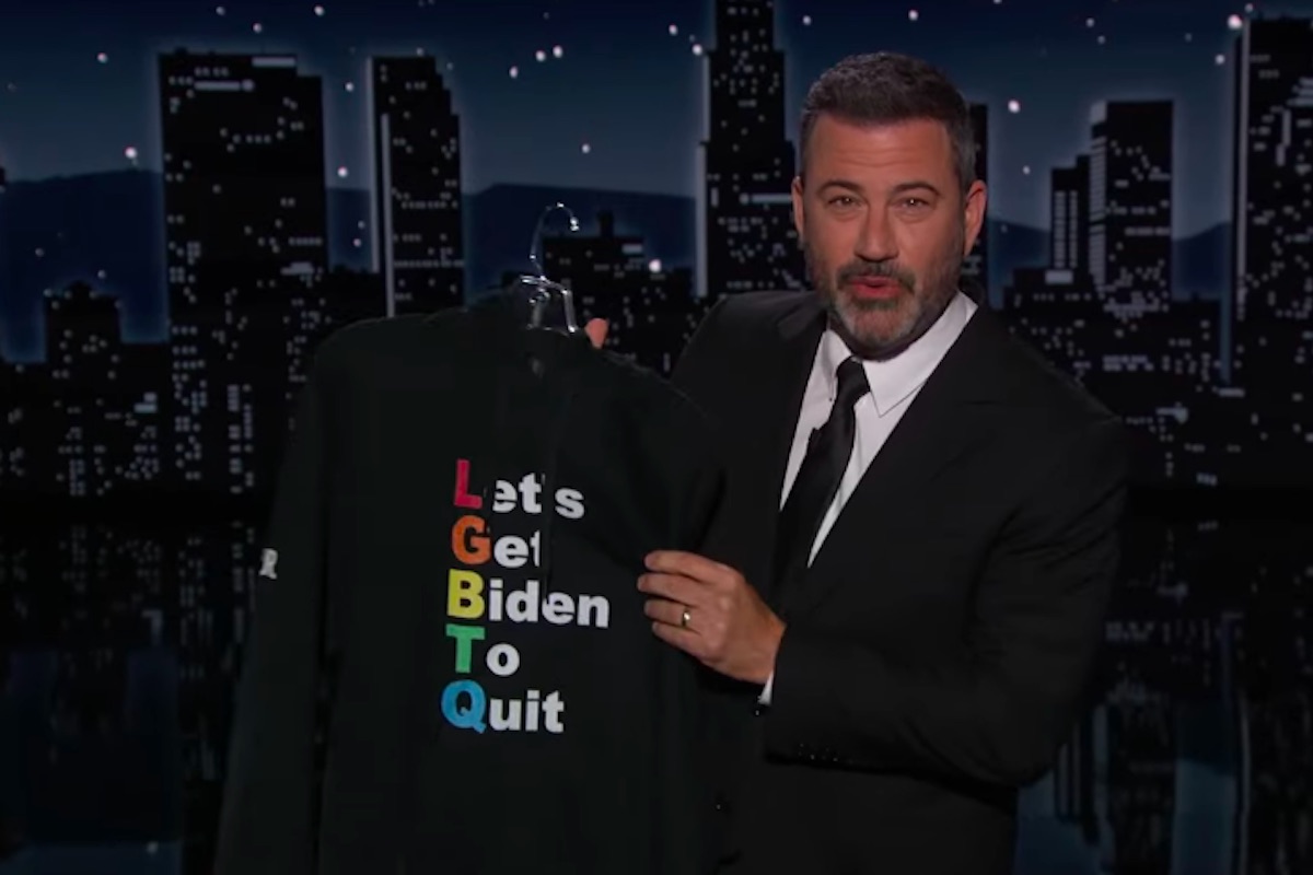 Jimmy Kimmel holds up a black hoodie with LGBTQ in rainbow letters, serving as an acrostic for "let's get biden to quit"
