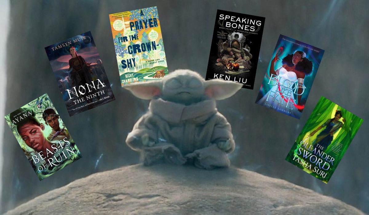 Grogu meditating next around floating 2022 books. Image: Lucasfilms, G.P. Putnam's Sons Books for Young Readers, Tordotcom, Gallery / Saga Press, Margaret K. McElderry Books, and Orbit. 