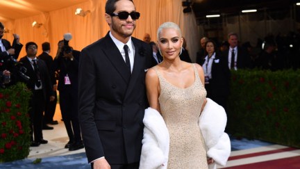 US socialite Kim Kardashian and comedian Pete Davidson arrive for the 2022 Met Gala at the Metropolitan Museum of Art on May 2, 2022, in New York. - The Gala raises money for the Metropolitan Museum of Art's Costume Institute. The Gala's 2022 theme is 