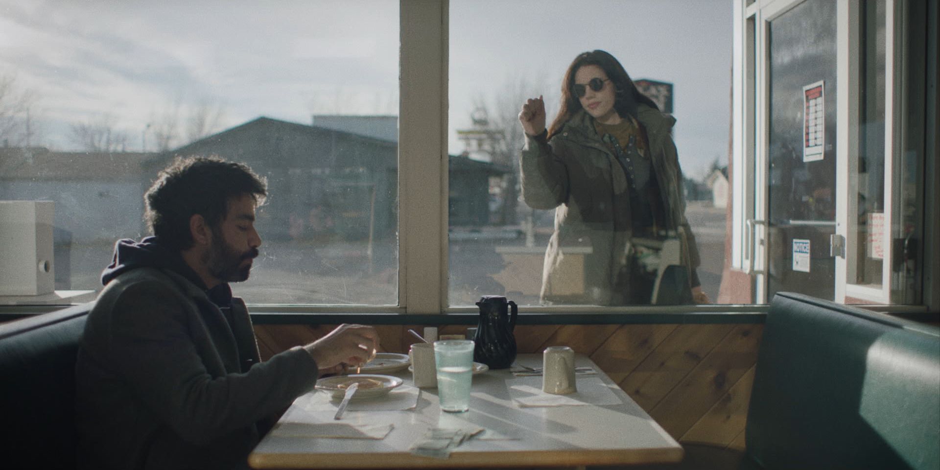 Rahul Kohli and Katie Parker in Next Exit