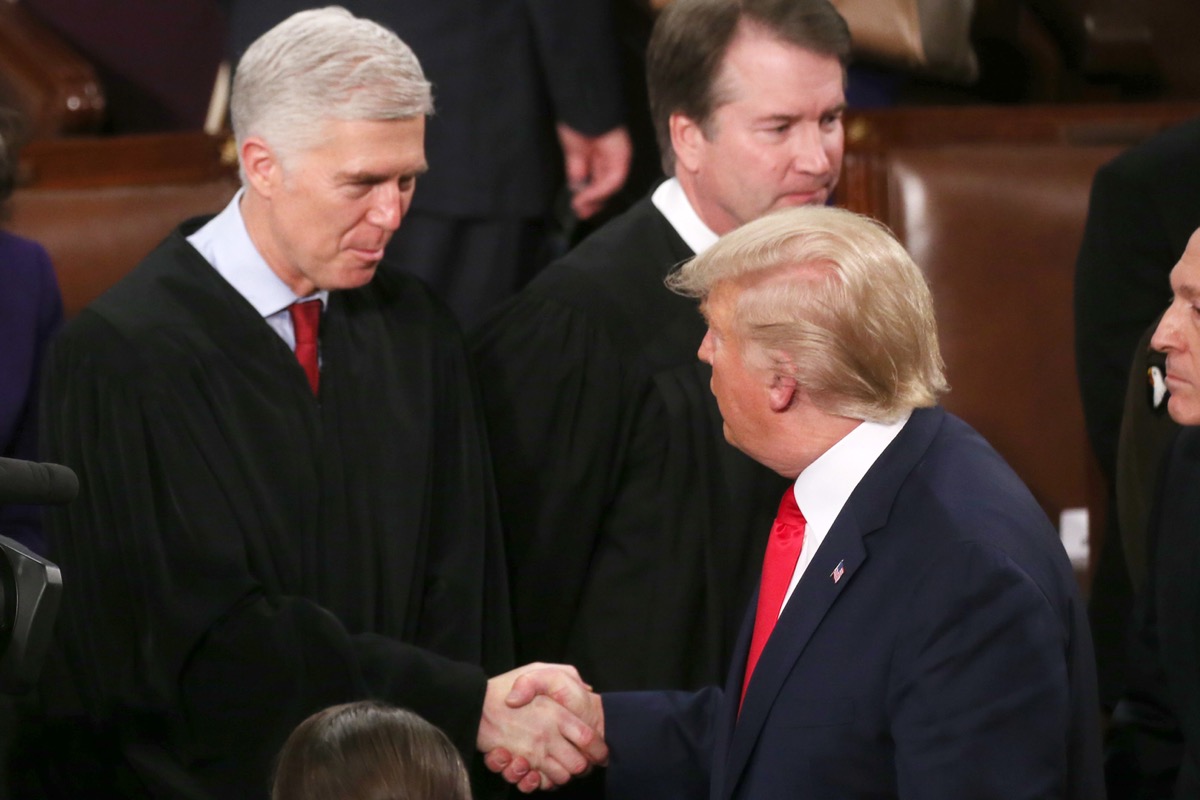 WASHINGTON, DC - FEBRUARY 04: U.S. President Donald Trump greets Supreme Court Justice Neil Gorsuch ahead of the State of the Union address in the chamber of the U.S. House of Representatives on February 04, 2020 in Washington, DC. President Trump delivers his third State of the Union to the nation the night before the U.S. Senate is set to vote in his impeachment trial. (Photo by Mario Tama/Getty Images)