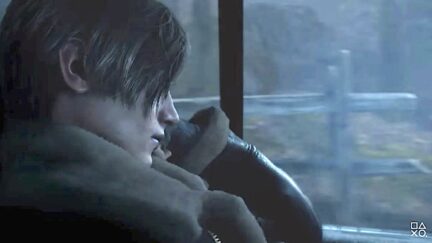 Leon stares out a window in Resident Evil