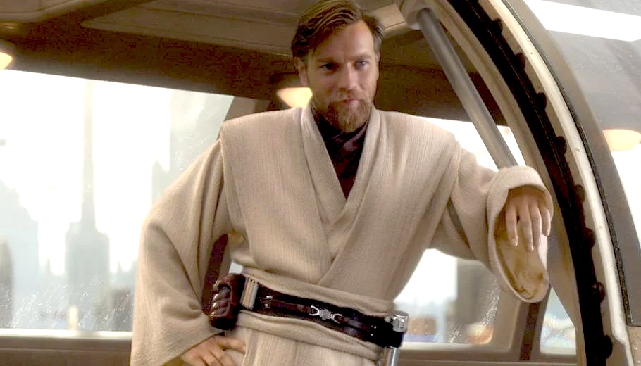 Obi-Wan Kenobi casually leans down.
