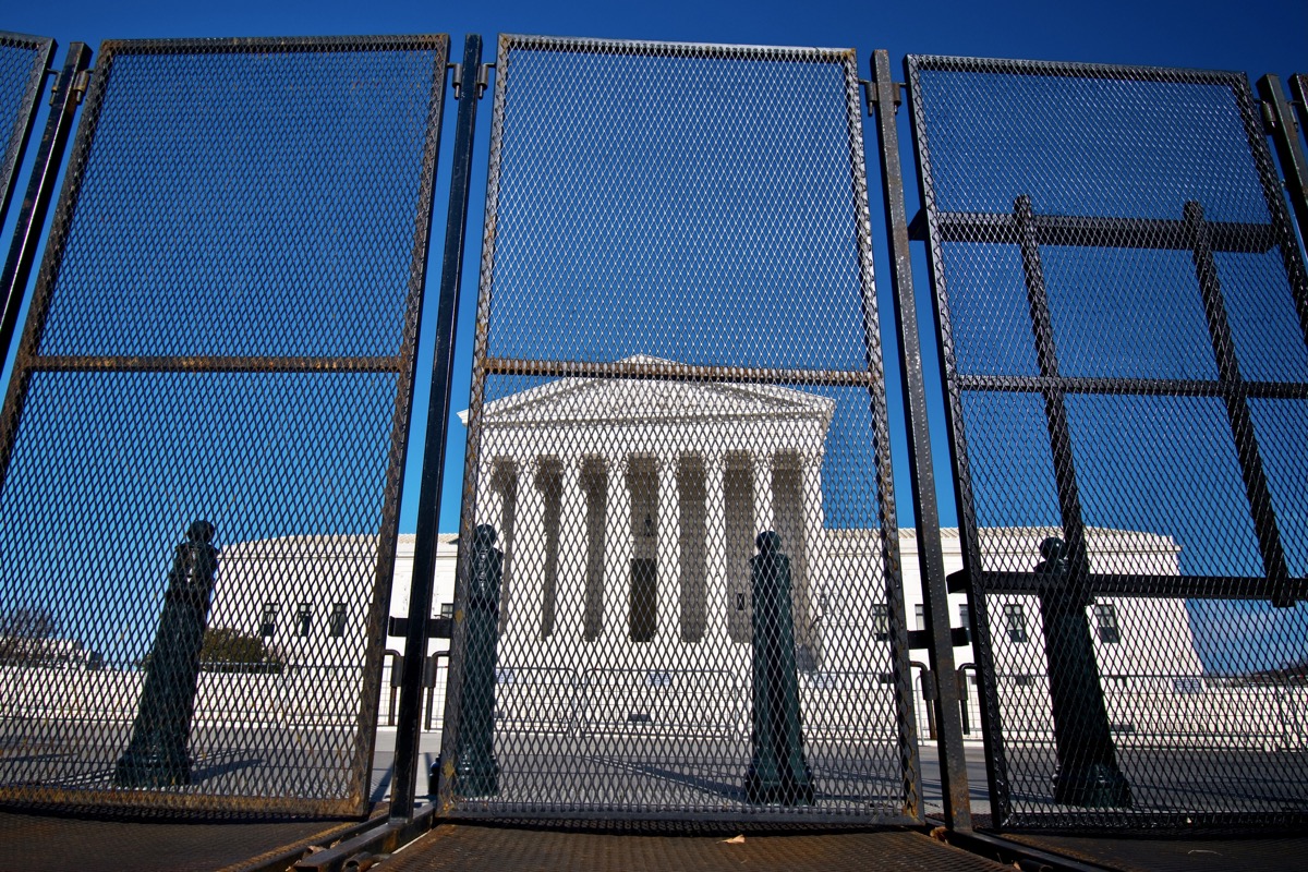 U.S. Supreme Court behind a high fence.