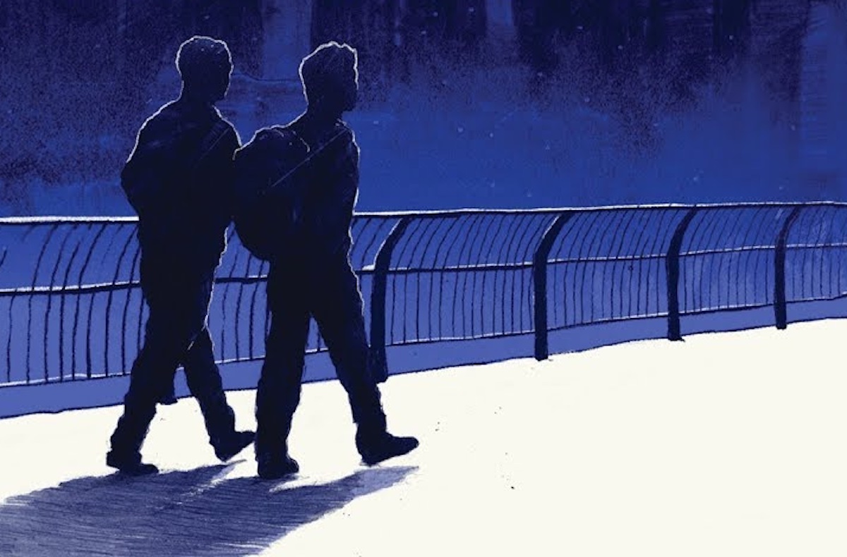 Two young men walk along a cityscape in the book cover for 'They Both Die in the End'