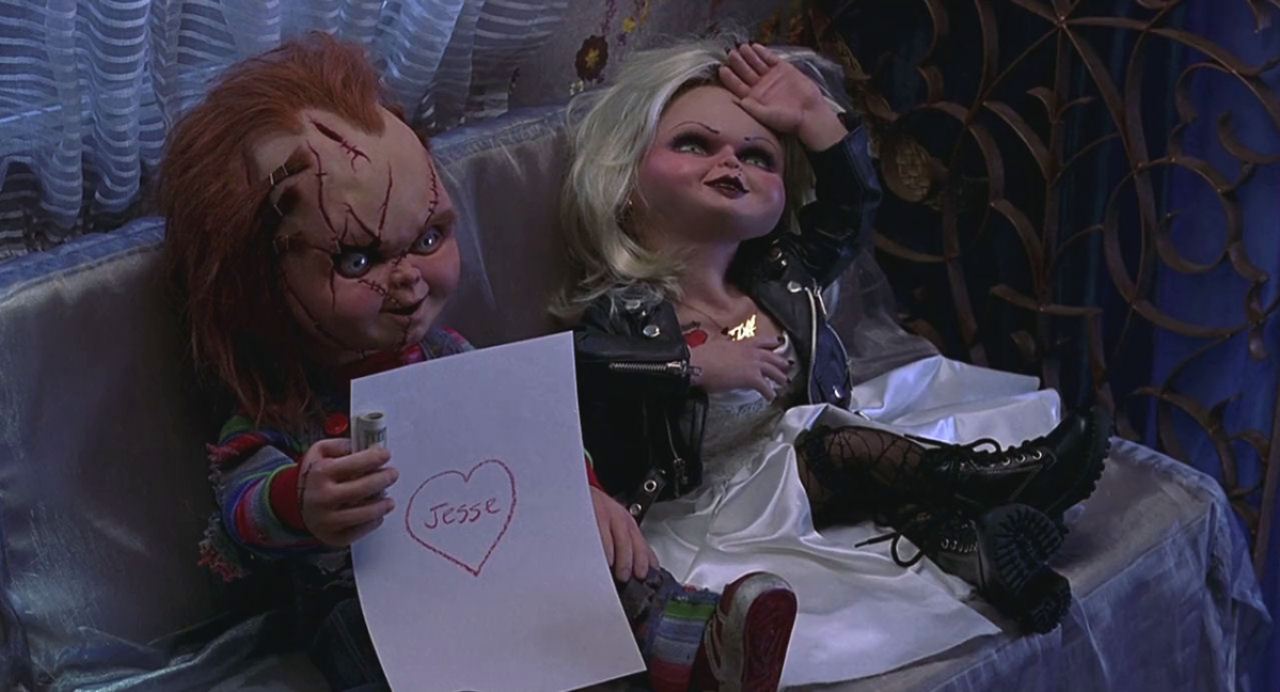 tiffany and chucky staging themselves in Bride of Chucky
