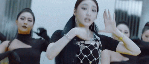 A gif of Chungha from the music video of "Stay Tonight"