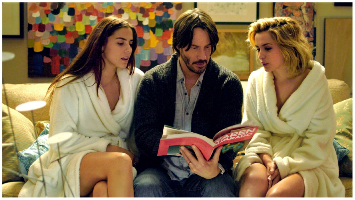 Lorenza Izzo, Keanu Reeves, and Ana de Armas in 'Knock Knock'.