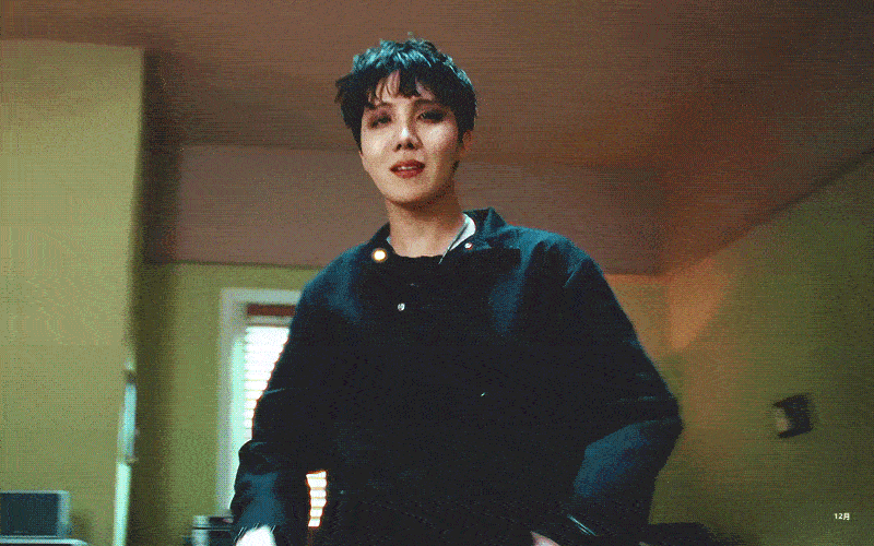 J-Hope from BTS in the music video for his solo debut, "More"