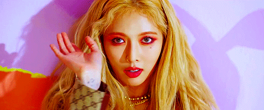 A gif of K-Pop soloist Hyuna from the music video of her single "Lip & Hip"