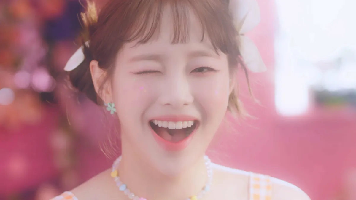 A screenshot of LOONA member Chuu in the music video for the group's most recent release, Flip That