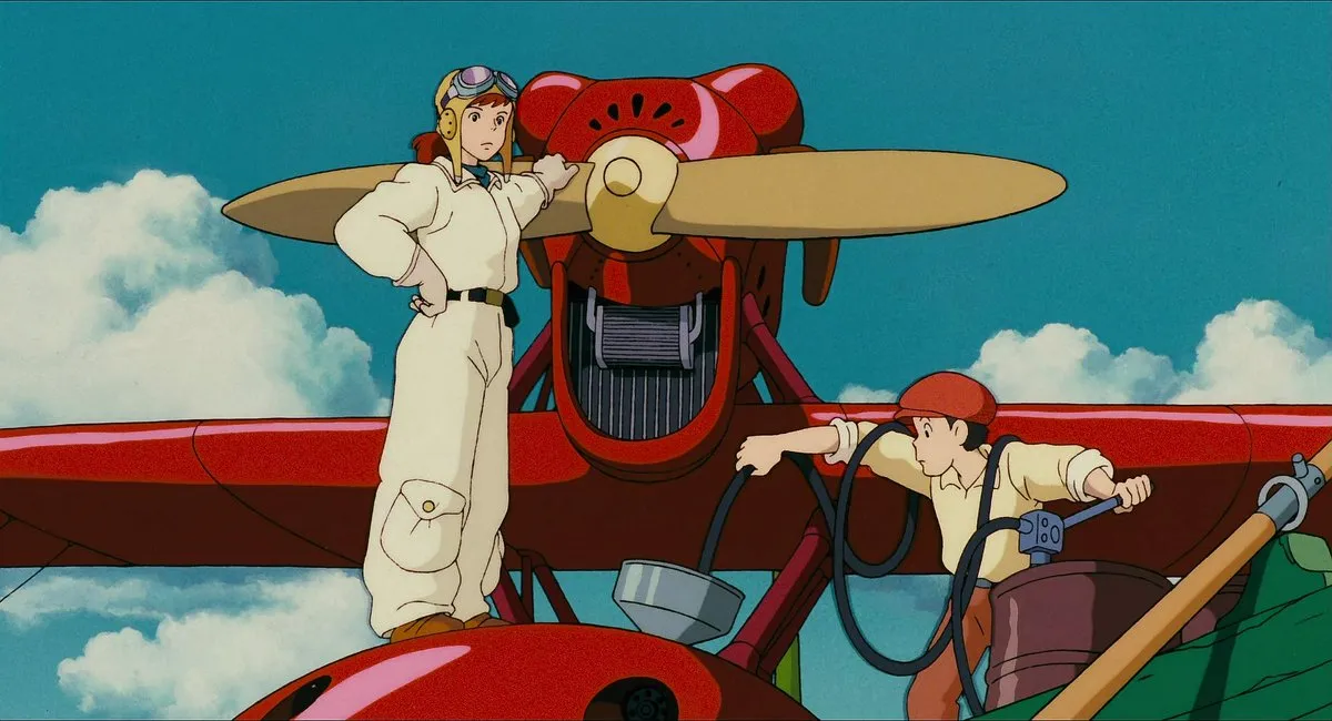 Fio from Porco Rosso stood on top of a plane with her crew members