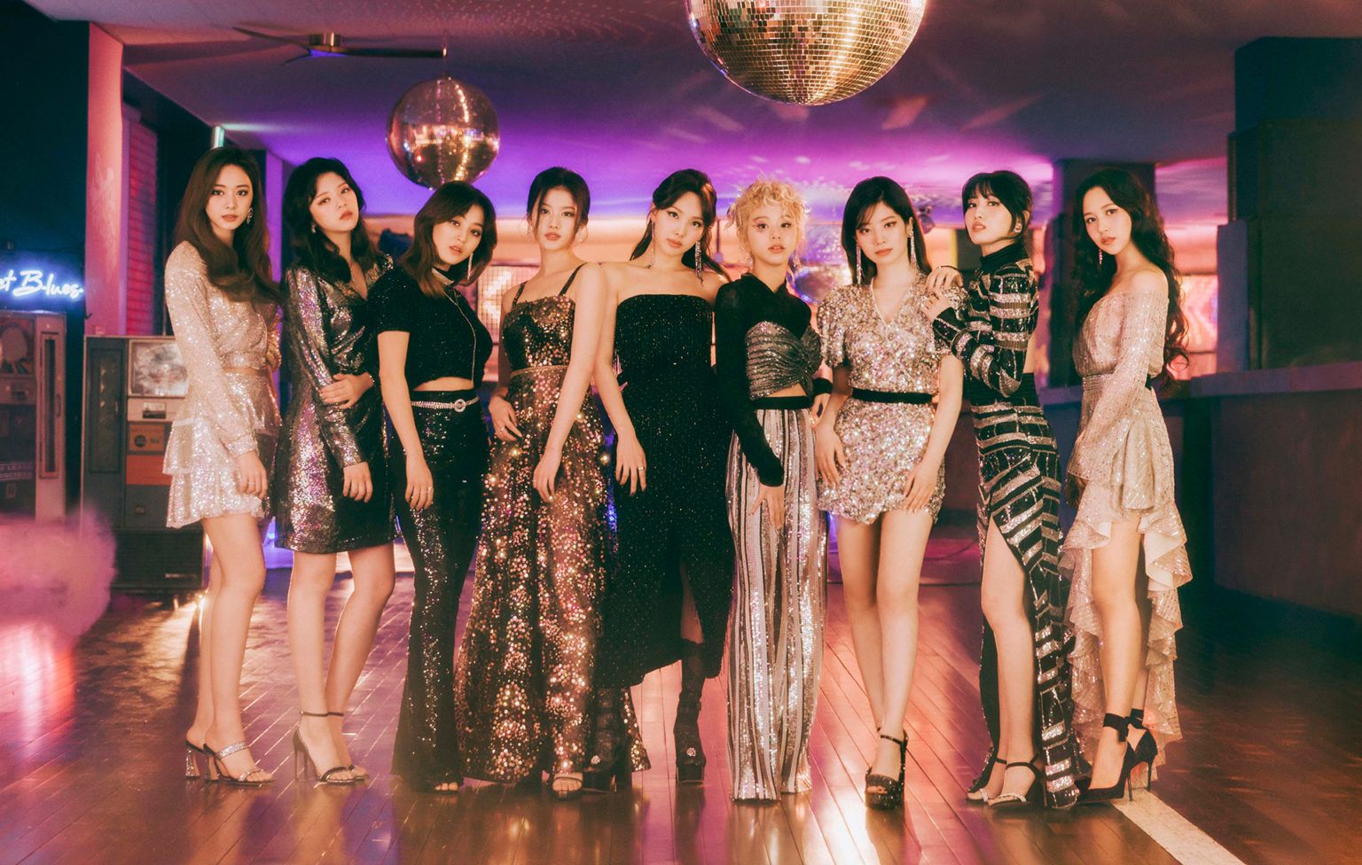 The nine members of K-Pop girl group TWICE during the promotions for their Japanese release Kura Kura