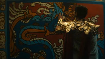 screencap from Black Panther: Wakanda Forever showing probably Namor looking at Aztec styled wall. Image: Marvel Entertainment.